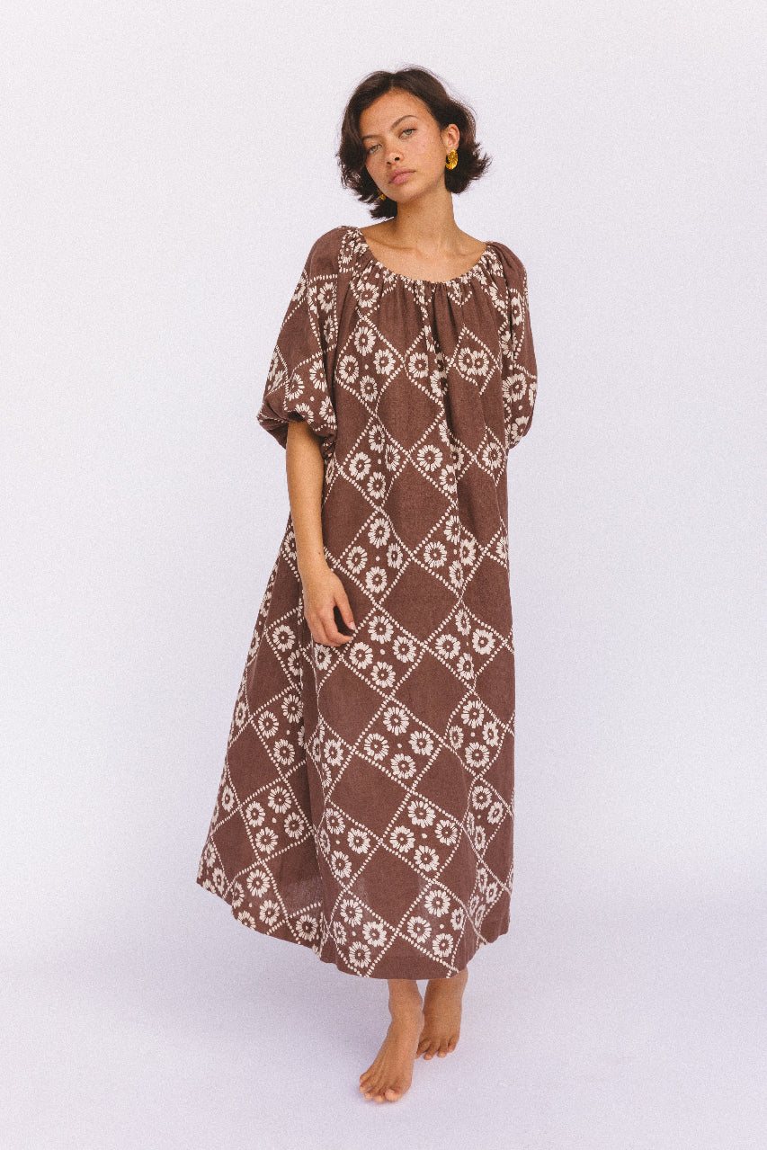 Dahlia Maxi Dress Maple — studio model full length on white, on-shoulder neckline, hand block print linen maxi showing complete silhouette and Jaipur artisan pattern | Daughters of India