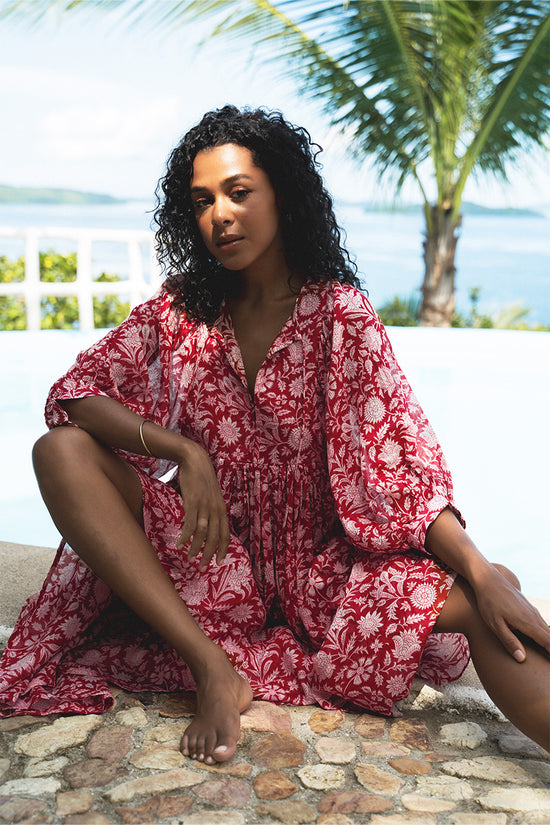 Daughters of India Kyra Midi Dress in Saffron — poolside with ocean and mountain view, cotton